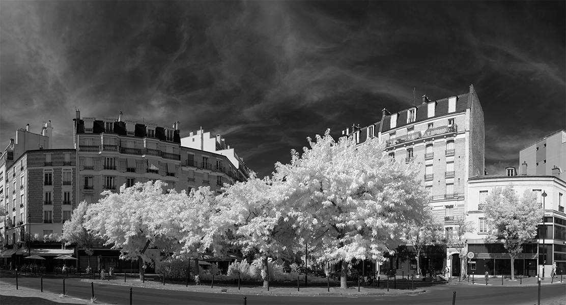 Infrared Panoramic Phote of Triangular Square in Paris with Trees.
